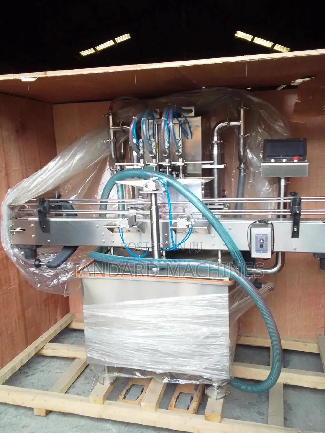 Automatic Four Nozzle Filling Machine