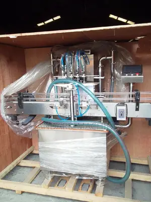 Automatic Four Nozzle Filling Machine