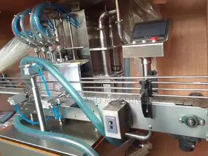 Automatic Four Nozzle Filling Machine