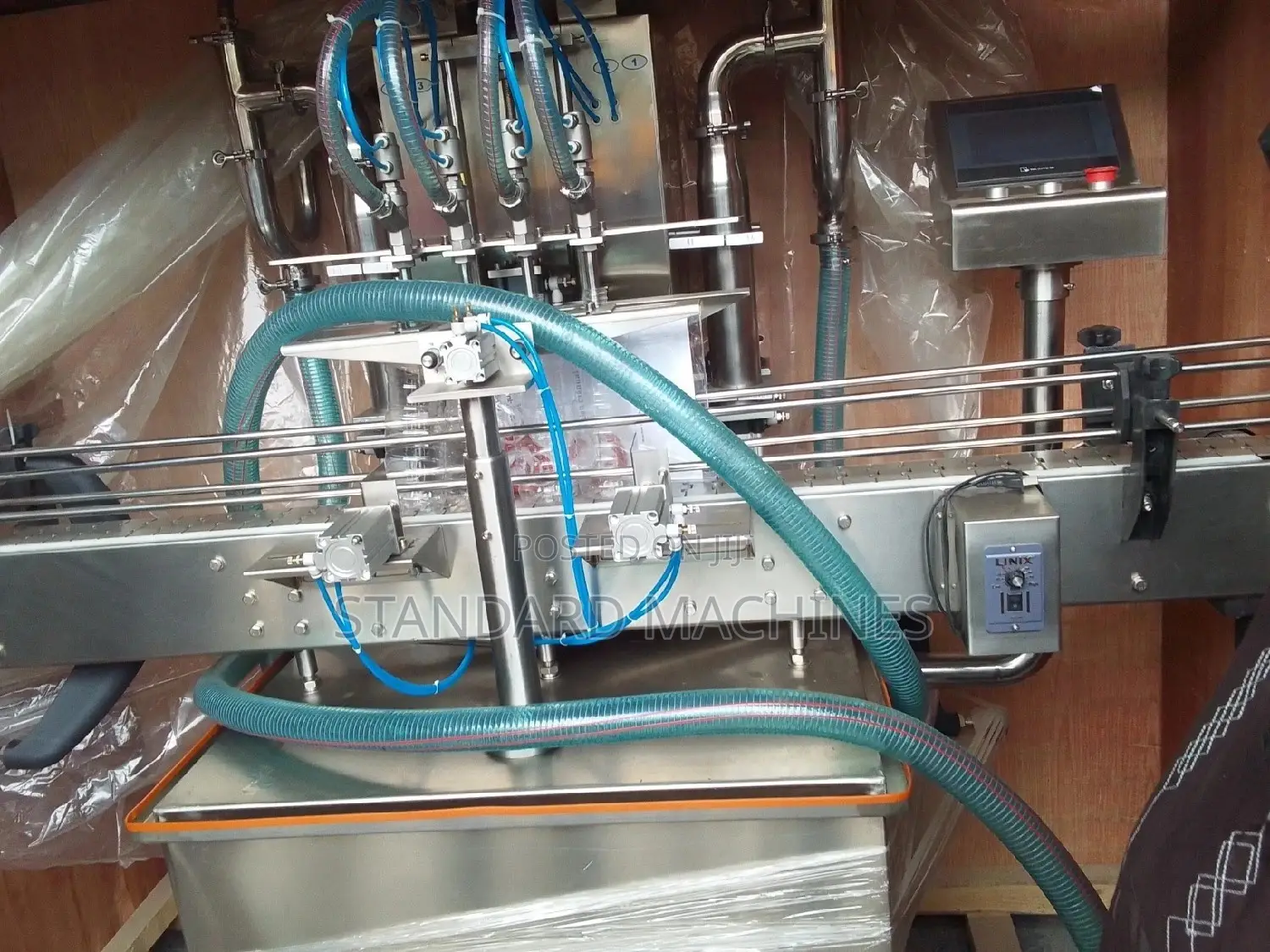 Automatic Four Nozzle Filling Machine