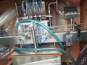 Automatic Four Nozzle Filling Machine