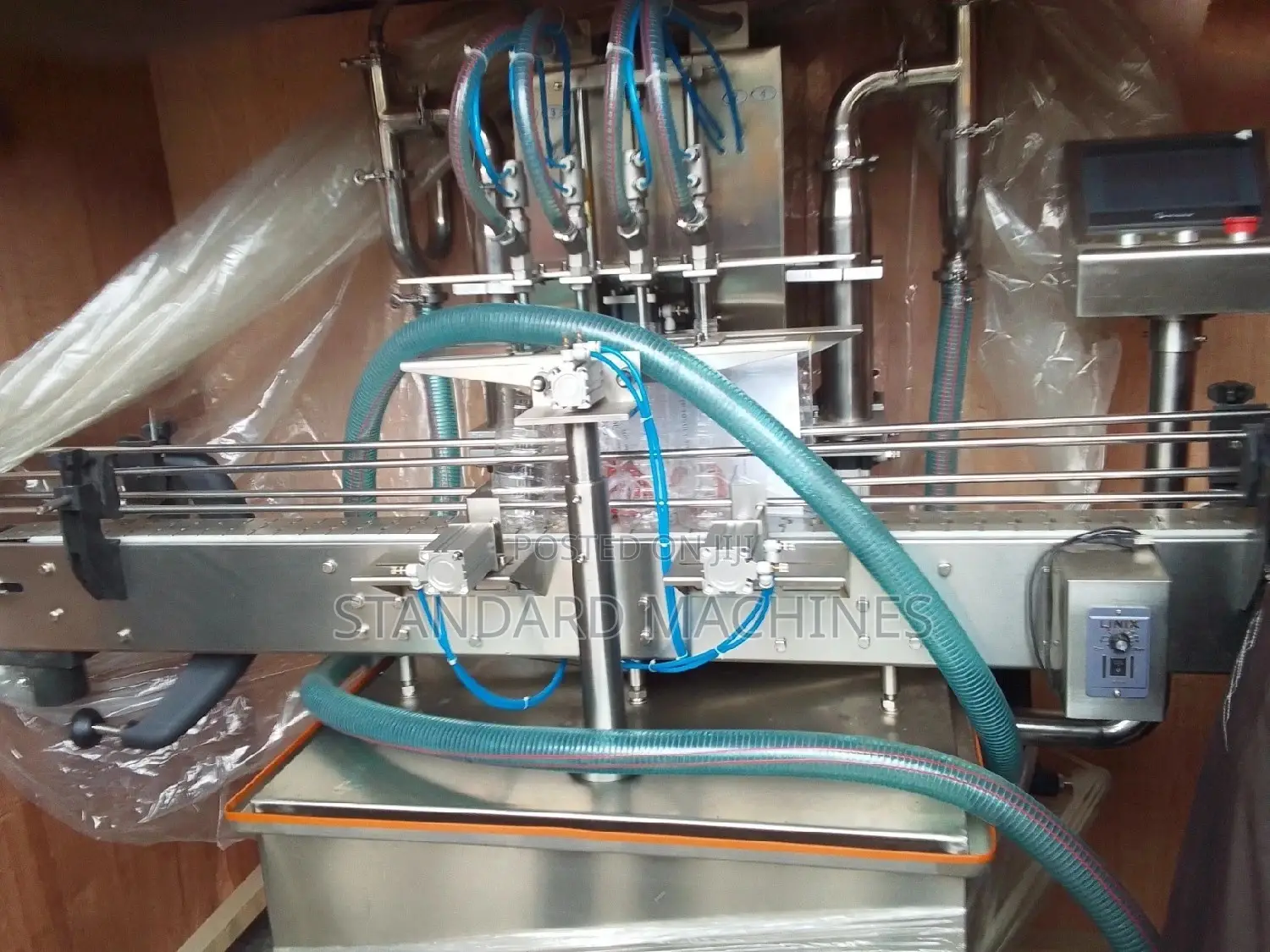 Automatic Four Nozzle Filling Machine