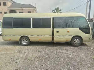 Toyota Coaster 2013 Gold