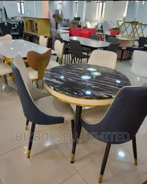 3 Seaters Marble Dining Table And Chairs.