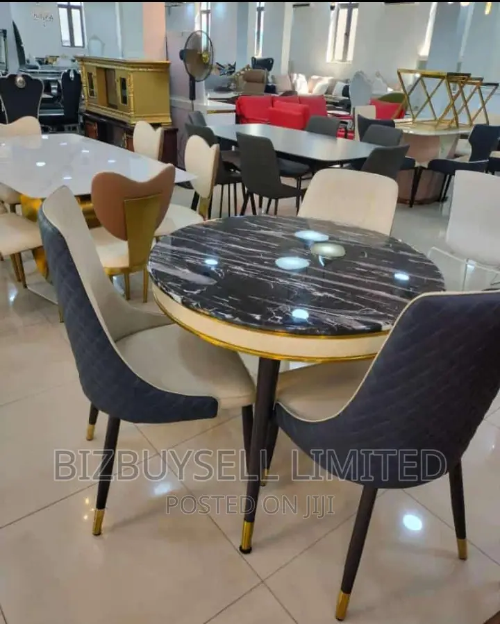 3 Seaters Marble Dining Table And Chairs.