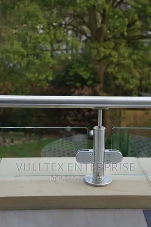 Dwarfed. Balcony Rail Glass/Stainless Steel