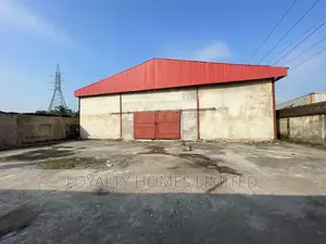 4 Plots of Land With a Brand New Warehouse