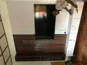 Solid Interior Full Wall TV Stand