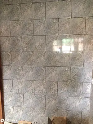 Fixing of Tiles