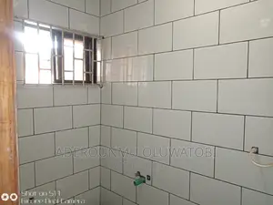 Fixing of Tiles