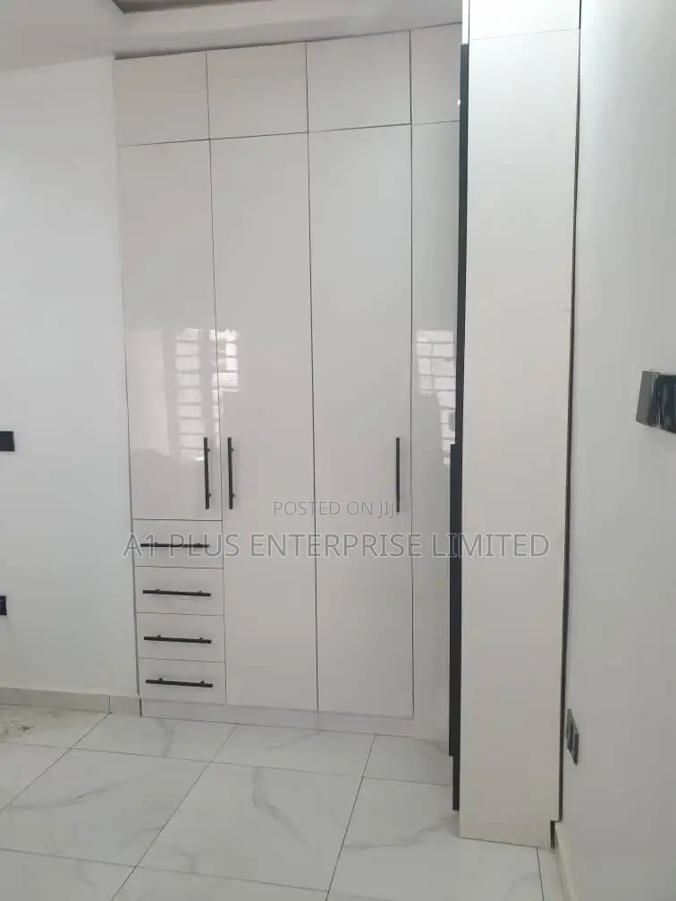 Modern White L-Shape Wardrobe With Glass