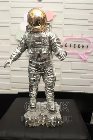 Silver Gold Spaceman Astronaut Sculpture