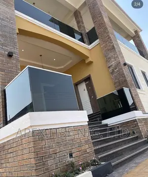 Tinted Glass for Up Down Balcony With Silver Top Rail.