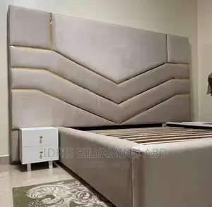 A Classic Bedframe With Two Side Cupboard