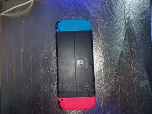 Nintendo Switch Oled With 8/15 Games
