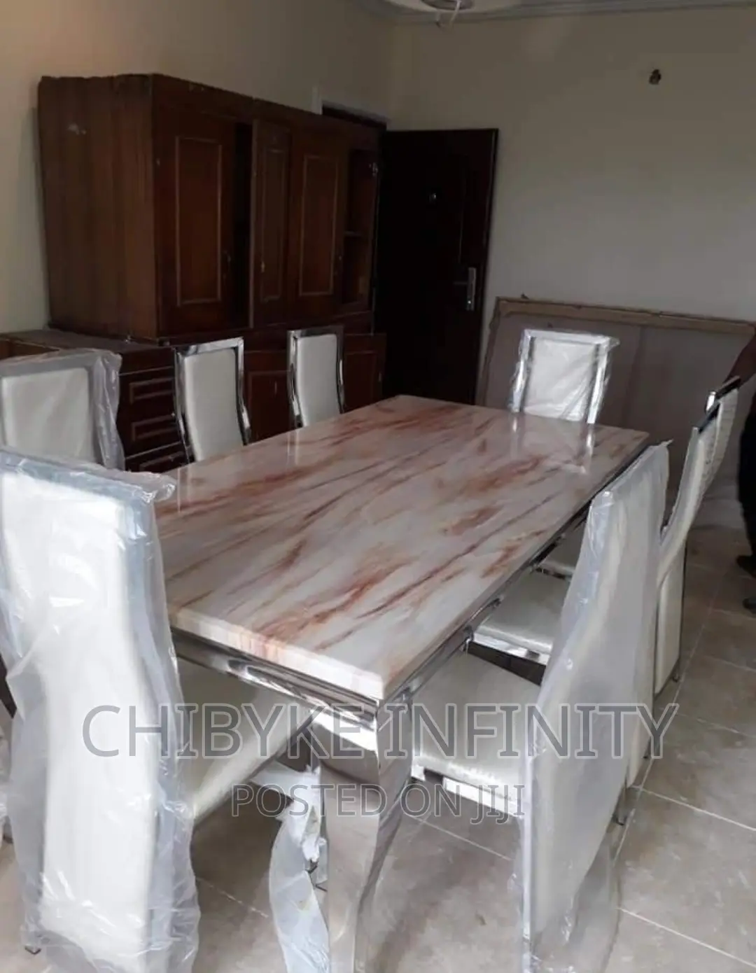 Quality 8-Seater Marble Dining Table With 8-Exotic Chairs