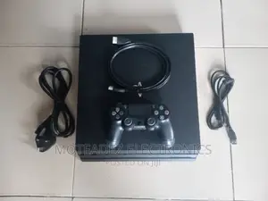 Uk Used Sony Ps4 Pro With Games Installed, 2 Pads and Cables