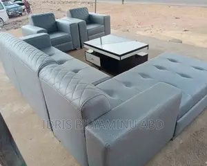 A Classic Corner Unit With Two Single and Center Table