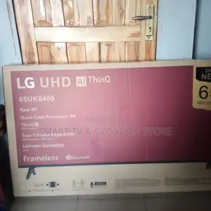 65inches LG Smart TV With Building Showcasing Apps