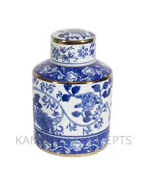 Photo - Blue and White Ceramic Jar With Gold Edges.