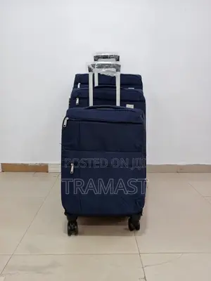 4 Wheel Blue Travels Suitcase