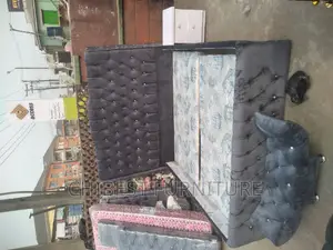 6by6 Ulphostery Bed Frame With Bed Side And An Ottoman