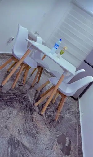 Wooden Leg Dining Table by 4