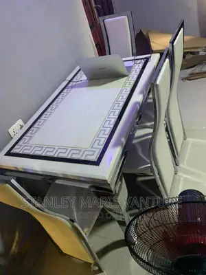 Versace Marble Dinning With Four Leather Seats