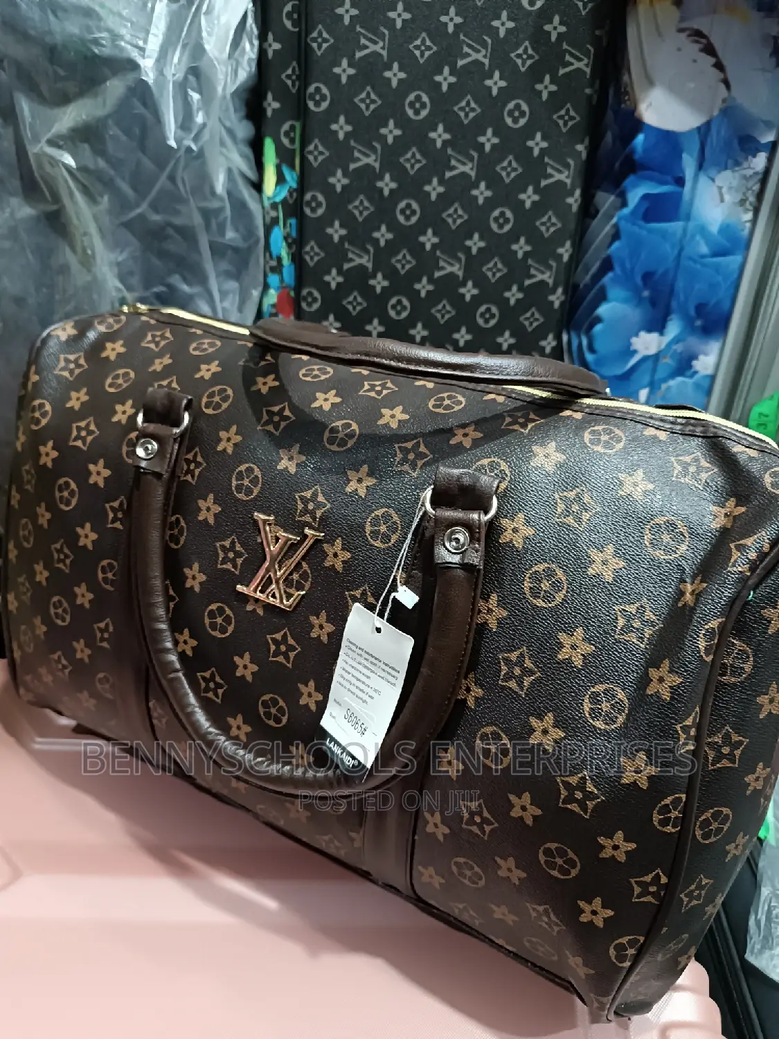 Small Luis Vuitton Leather Duffle Bag