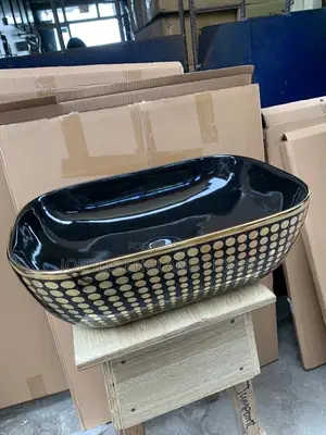 Executive Gold and Black Basin Top