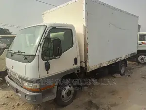 Photo - Mitsubishi Canter 2000 Yellow