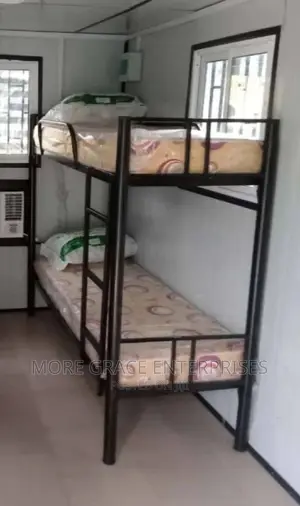 Double Bunk Bed With Mattresses and Pillows
