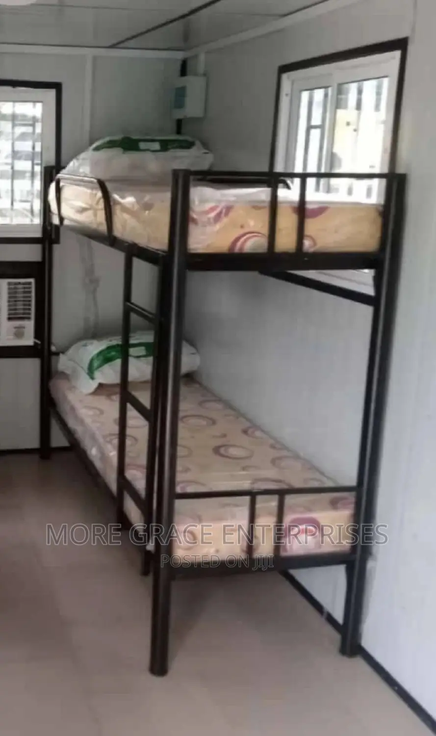 Double Bunk Bed With Mattresses and Pillows