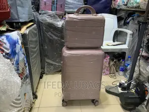 Small Size Unbreakable Rubber Hand Luggage With Carry on Kit