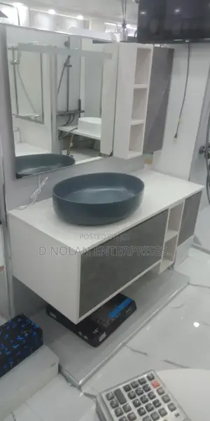 Master Cabinet With Black Counter Top Basin