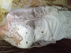 Off-White Wedding Gown With Veil