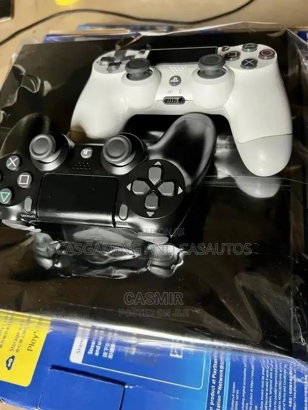 Playstation 4 (PS4) With Two Controllers.
