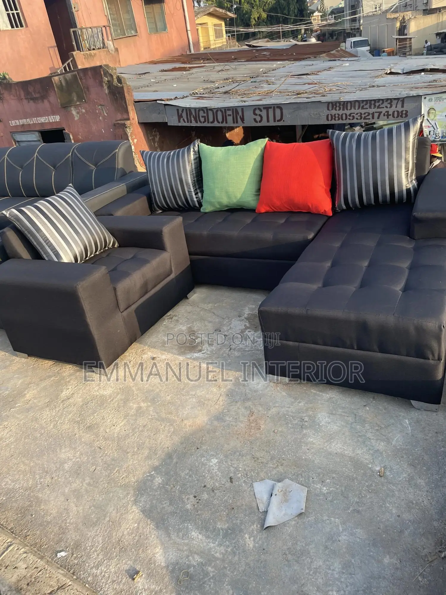 A Standard L Shape Sofa With Additional Single