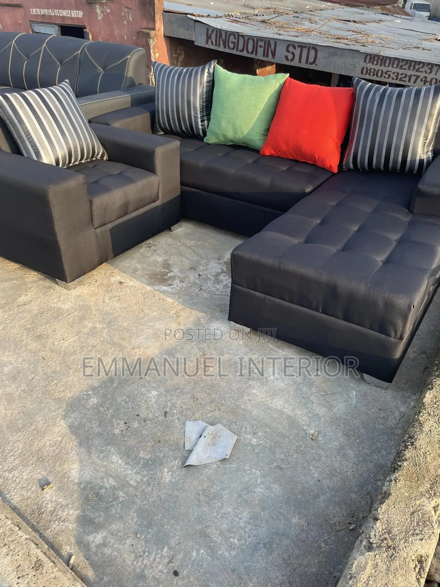 A Standard L Shape Sofa With Additional Single