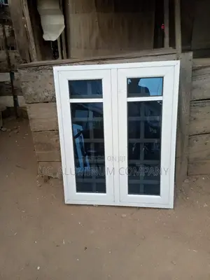 White Casement Window With Burglary and Net