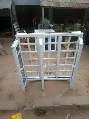 White Casement Window With Burglary and Net