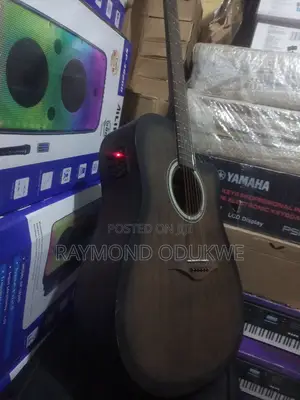 Photo - Semi Electric Acoustic Guitar With Chromatic Tunner Effects