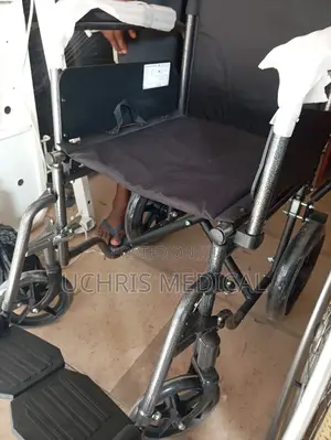 Pusher Wheelchair