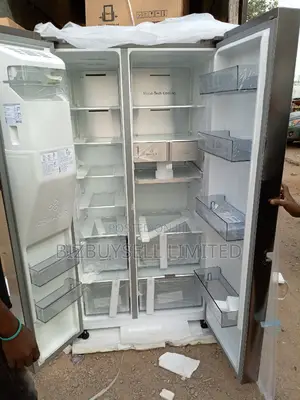 Side by Side Hisence Refrigerator With Water Dispenser.
