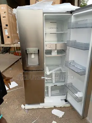Side by Side Hisence Refrigerator With Water Dispenser.