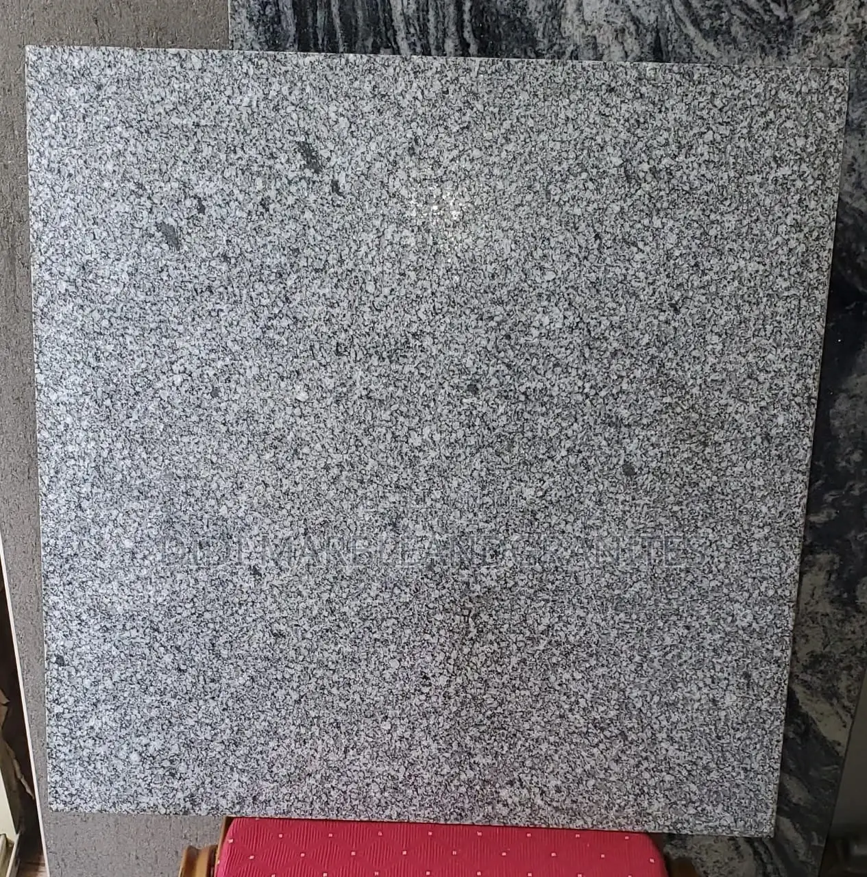 Flamed Granite for Compound and Poolside.