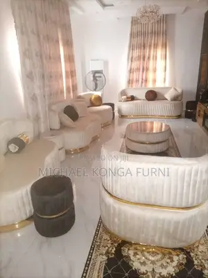 Set of Luxurious Sofa With Puff and Center Table