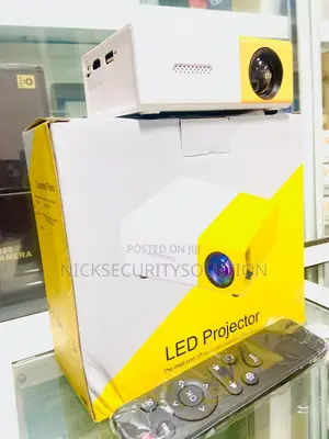 Mini LED Projector Portable Built-in Speaker Remote