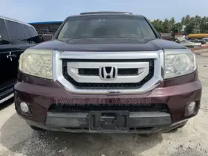 Honda Pilot Touring w/RES/Navi 4WD (3.5L 6cyl 5A) 2011 Burgundy