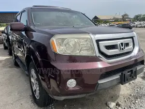 Honda Pilot Touring w/RES/Navi 4WD (3.5L 6cyl 5A) 2011 Burgundy